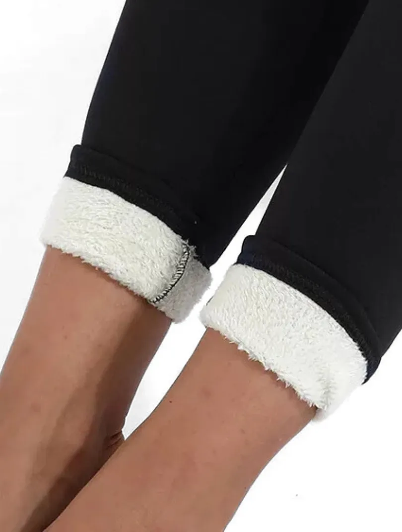 Cuffs folded to show the sherpa lining